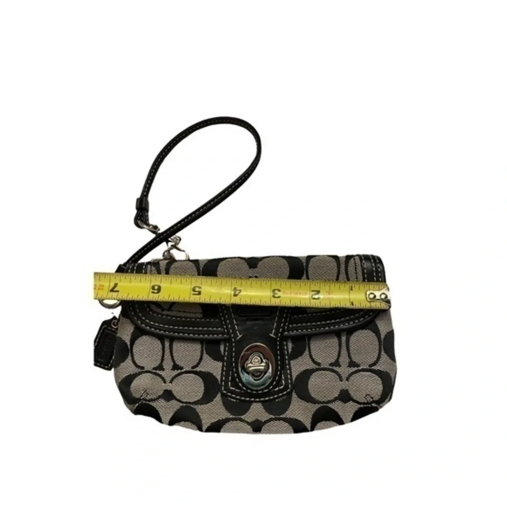 Coach black and gray signature c wristlet bag